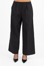Pantaloni Fluidi Neri con Maxi Risvolto - Jurerê