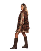 Tavus pelliccia smanicata