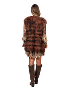 Tavus pelliccia smanicata