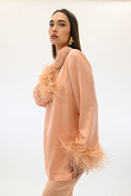 Twinset blusa con piume color salmone